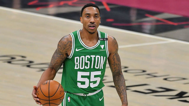 CLEVELAND, OHIO - MARCH 17: Jeff Teague #55 of the Boston Celtics brings the ball up court during the first quarter against the Cleveland Cavaliers at Rocket Mortgage Fieldhouse on March 17, 2021 in Cleveland, Ohio. NOTE TO USER: User expressly acknowledges and agrees that, by downloading and/or using this photograph, user is consenting to the terms and conditions of the Getty Images License Agreement.