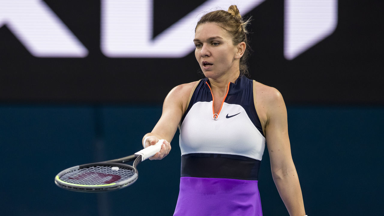 MELBOURNE, VIC - FEBRUARY 16: Simona Halep of Romania shows her frustration after an umpire decision during the quarterfinals of the 2021 Australian Open on February 16 2021, at Melbourne Park in Melbourne, Australia.