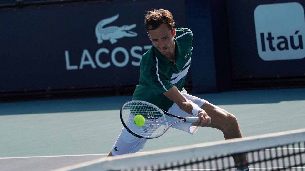 MIAMI GARDENS, FL - MARCH 28: Daniil Medvedev (RUS) hits a short ball during the third round match of the Miami Open on March 28, 2021, at Hard Rock Stadium in Miami Gardens, Florida.