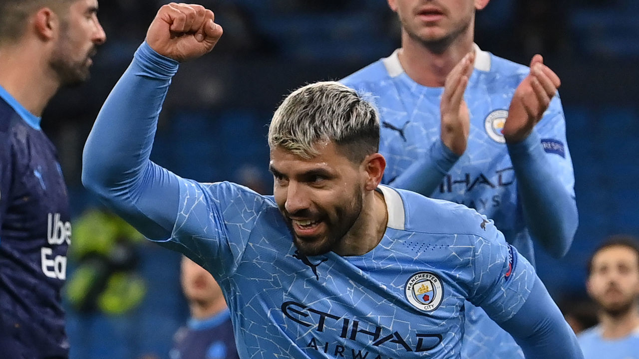 Manchester City's Argentinian striker Sergio Aguero celebrates after he scores his team's second goal during the UEFA Champions League 1st round day 6 group C football match between Manchester City and Marseille at the Etihad Stadium in Manchester, north west England, on December 9, 2020.