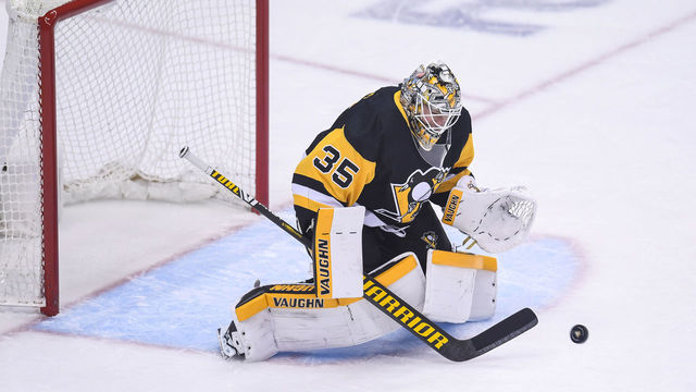 PITTSBURGH, PA - MARCH 24: Pittsburgh Penguins Goalie Tristan Jarry (35) makes a save during the first period in the NHL game between the Pittsburgh Penguins and the Buffalo Sabres on March 24, 2021, at PPG Paints Arena in Pittsburgh, PA.
