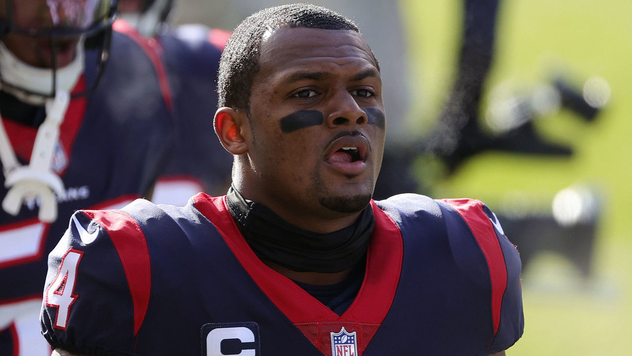 CHICAGO, ILLINOIS - DECEMBER 13: Houston Texans quarterback Deshaun Watson #4 walks off the field after warm ups against the Chicago Bears at Soldier Field on December 13, 2020 in Chicago, Illinois.