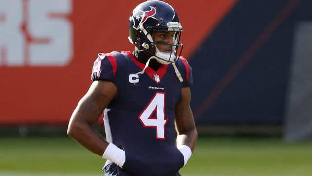 CHICAGO, ILLINOIS - DECEMBER 13: Houston Texans quarterback Deshaun Watson #4 warms up against the Chicago Bears at Soldier Field on December 13, 2020 in Chicago, Illinois.