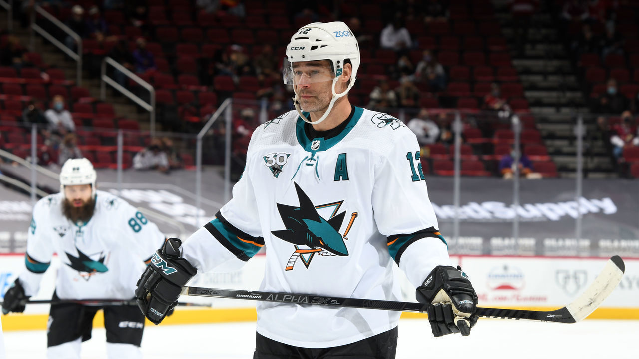 GLENDALE, ARIZONA - MARCH 27: Patrick Marleau #12 of the San Jose Sharks gets ready during a face off against the Arizona Coyotes at Gila River Arena on March 27, 2021 in Glendale, Arizona. With the game, Marleau ties Mark Messier for 2nd on the NHL's all-time games played list.