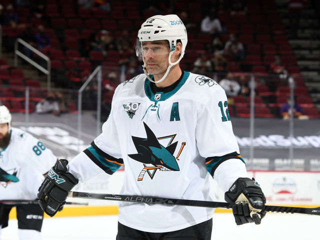 GLENDALE, ARIZONA - MARCH 27: Patrick Marleau #12 of the San Jose Sharks gets ready during a face off against the Arizona Coyotes at Gila River Arena on March 27, 2021 in Glendale, Arizona. With the game, Marleau ties Mark Messier for 2nd on the NHL's all-time games played list.