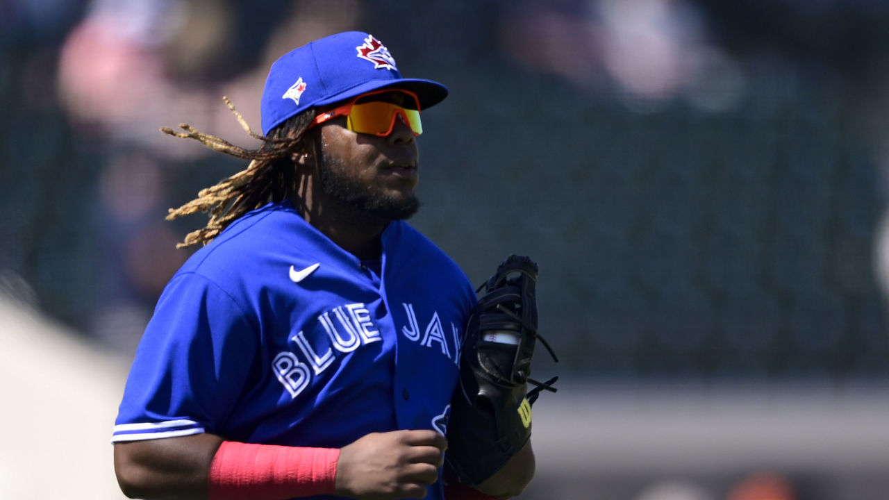 LAKELAND, FLORIDA - MARCH 04: Vladimir Guerrero Jr. #27 of the Toronto Blue Jays walks on the field during the third inning against the Detroit Tigers during a spring training game at Publix Field at Joker Marchant Stadium on March 04, 2021 in Lakeland, Florida.