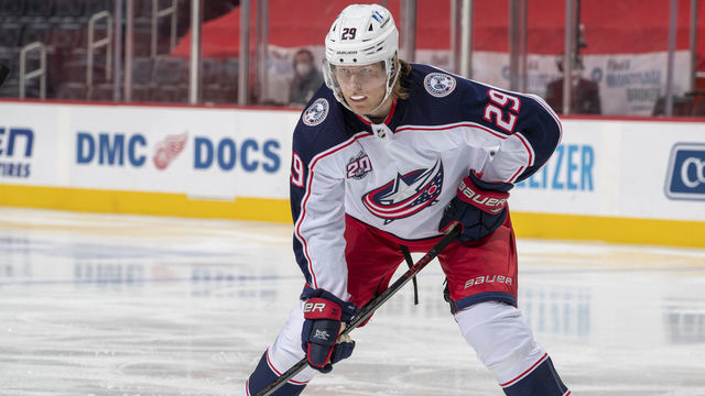 DETROIT, MI - MARCH 27: Patrik Laine #29 of the Columbus Blue Jackets lines up for a face-off during the second period of an NHL game against the Detroit Red Wings at Little Caesars Arena on March 27, 2021 in Detroit, Michigan.