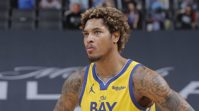 SACRAMENTO, CA - MARCH 25: Kelly Oubre Jr. #12 of the Golden State Warriors looks on during the game against the Sacramento Kings on March 25, 2021 at Golden 1 Center in Sacramento, California. NOTE TO USER: User expressly acknowledges and agrees that, by downloading and or using this photograph, User is consenting to the terms and conditions of the Getty Images Agreement. Mandatory Copyright Notice: Copyright 2021 NBAE