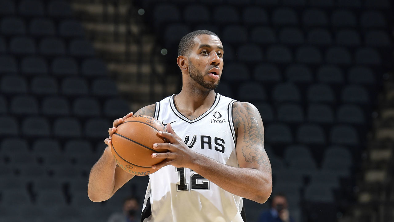 SAN ANTONIO, TX - JANUARY 30: LaMarcus Aldridge #12 of the San Antonio Spurs looks to pass the ball during the game against the Memphis Grizzlies on January 30, 2021 at the AT&T Center in San Antonio, Texas. Mandatory Copyright Notice: Copyright 2021 NBAE (Photos by Logan Riely/NBAE via Getty Images)