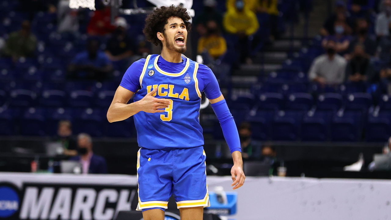 INDIANAPOLIS, IN - MARCH 30: Johnny Juzang #3 of the UCLA Bruins reacts to a basket against the Michigan Wolverines in the Elite Eight round of the 2021 NCAA Division I Men's Basketball Tournament held at Lucas Oil Stadium on March 30, 2021 in Indianapolis, Indiana.