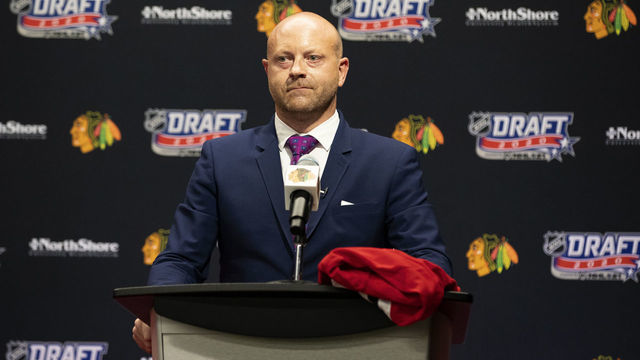 CHICAGO, ILLINOIS - OCTOBER 06: Vice president and general manager Stan Bowman of the Chicago Blackhawks speaks from the podium before their 17th overall pick in the first round of the 2020 NHL Entry Draft at Fifth Third Arena on October 06, 2020 in Chicago, Illinois. The 2020 NHL Draft was held virtually due to the ongoing Coronavirus pandemic.