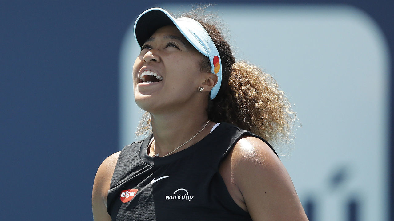 MIAMI GARDENS, FLORIDA - MARCH 31: Naomi Osaka of Japan reacts against Maria Sakkari of Greece in their quarterfinal match of the Miami Open at Hard Rock Stadium on March 31, 2021 in Miami Gardens, Florida.