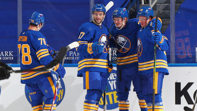 BUFFALO, NY - MARCH 31: Casey Mittelstadt #37 celebrates his second period goal with Steven Fogarty #17, Victor Olofsson #68, and Jacob Bryson #78 of the Buffalo Sabres during an NHL game against the Philadelphia Flyers on March 31, 2021 at KeyBank Center in Buffalo, New York.
