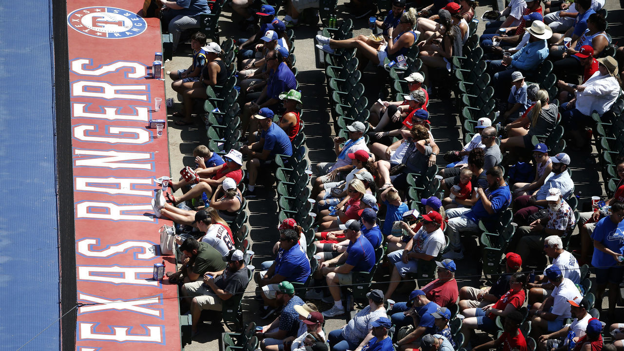 ARLINGTON, TX - AUGUST 5: Fans watch the game between the Texas Rangers and the Baltimore Orioles at Globe Life Park in Arlington on August 5, 2018 in Arlington, Texas.