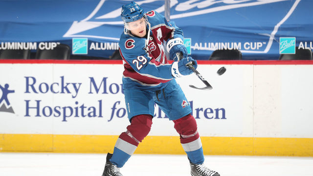 DENVER, COLORADO - MARCH 31: Nathan MacKinnon #29 of the Colorado Avalanche skates during warm ups prior to the game against the Arizona Coyotes on March 31, 2021 in Denver, Colorado.