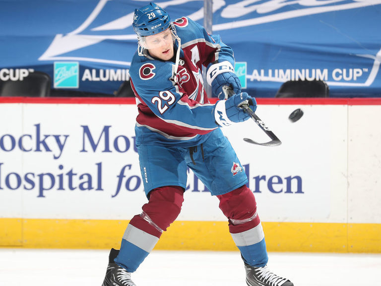 Watch MacKinnon ejected after throwing helmet at Garland