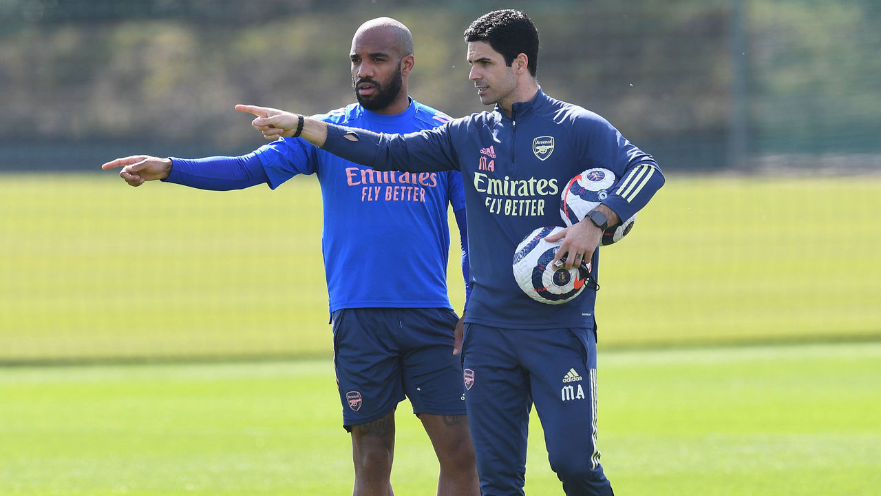 ST ALBANS, ENGLAND - MARCH 30: Arsenal manager Mikel Arteta with Alex Lacazette during a training session at London Colney on March 30, 2021 in St Albans, England.