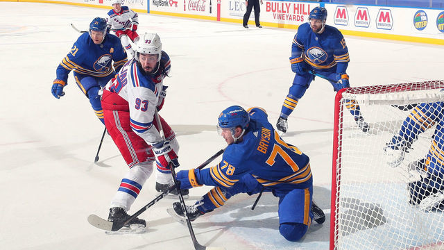 BUFFALO, NY - APRIL 1: Jacob Bryson #78 of the Buffalo Sabres defends in the goal crease against Mika Zibanejad #93 of the New York Rangers during an NHL game on April 1, 2021 at KeyBank Center in Buffalo, New York. New York won, 3-2 in overtime.