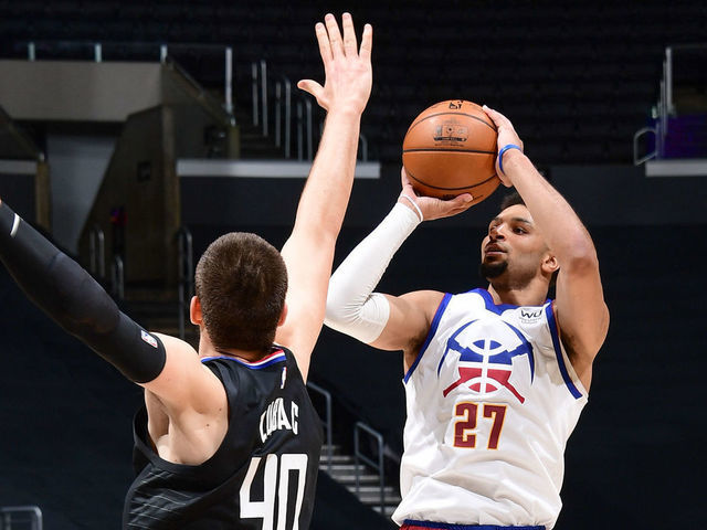 LOS ANGELES, CA - APRIL 1: Jamal Murray #27 of the Denver Nuggets shoots the ball during the game against the LA Clippers on April 1, 2021 at STAPLES Center in Los Angeles, California. NOTE TO USER: User expressly acknowledges and agrees that, by downloading and/or using this Photograph, user is consenting to the terms and conditions of the Getty Images License Agreement. Mandatory Copyright Notice: Copyright 2021 NBAE
