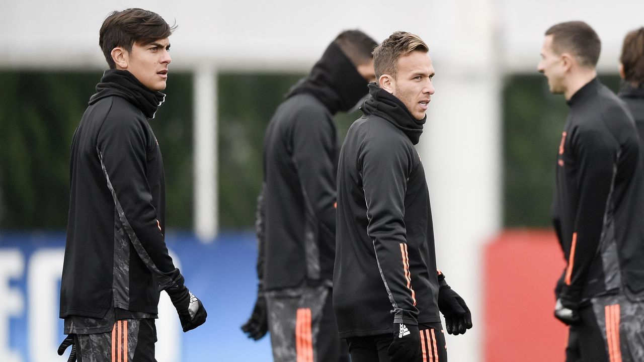BARCELONA, SPAIN - DECEMBER 07: Juventus players Paulo Dybala and Arthur ahead of the UEFA Champions League Group G stage match between Juventus and FC Barcelona at Camp Nou on December 07, 2020 in Barcelona, Spain.
