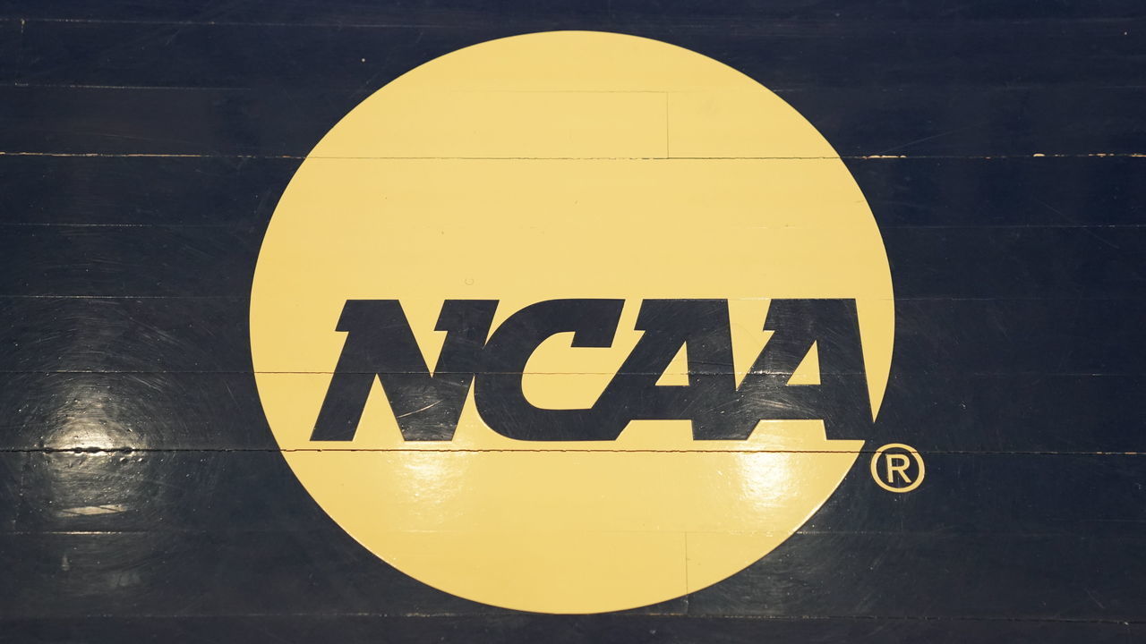 WASHINGTON, DC - MARCH 03: The NCAA logo on the floor during a Atlantic 10 Women's Basketball Tournament - First Round college basketball game between the Richmond Spiders and the George Washington Colonials at the Smith Center on March 3, 2020 in Washington, DC.