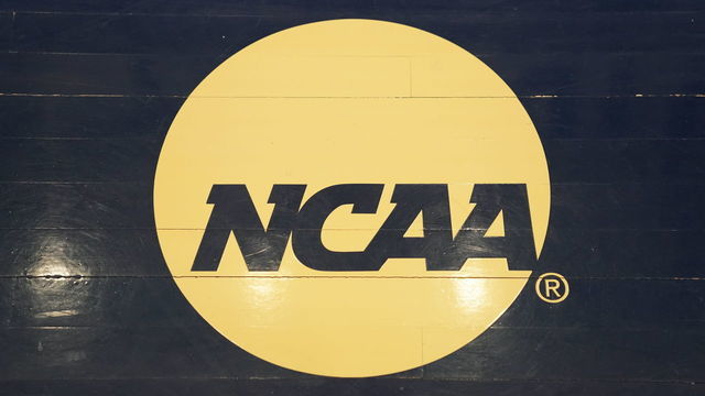 WASHINGTON, DC - MARCH 03: The NCAA logo on the floor during a Atlantic 10 Women's Basketball Tournament - First Round college basketball game between the Richmond Spiders and the George Washington Colonials at the Smith Center on March 3, 2020 in Washington, DC.