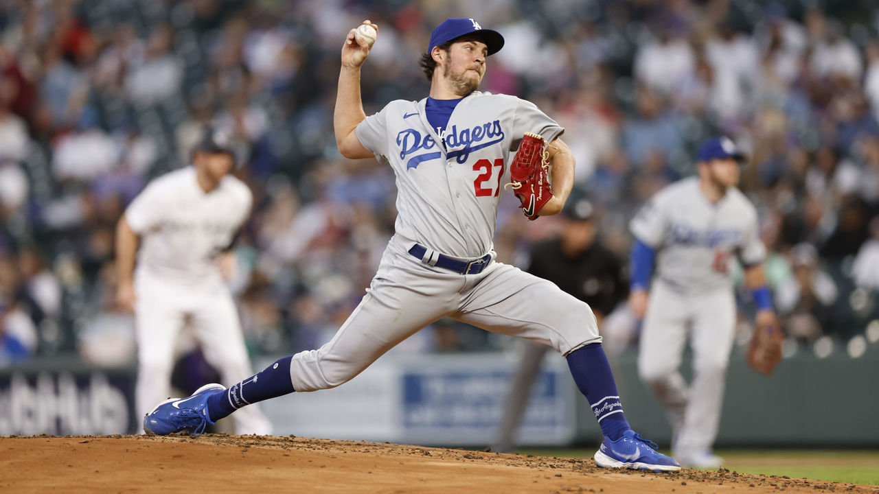 DENVER, CO - APRIL 2: Starting pitcher Trevor Bauer #27 of the Los Angeles Dodgers delivers to home plate during the second inning against the Colorado Rockies at Coors Field on April 2, 2021 in Denver, Colorado. The Rockies defeated the Dodgers 8-5.