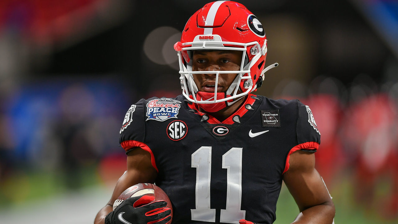 ATLANTA, GA JANUARY 01: Georgia wide receiver Arian Smith (11) warms up prior to the start of the Chick-fil-A Peach Bowl between the Cincinnati Bearcats and the Georgia Bulldogs on January 1st, 2021 at Mercedes-Benz Stadium in Atlanta, GA.