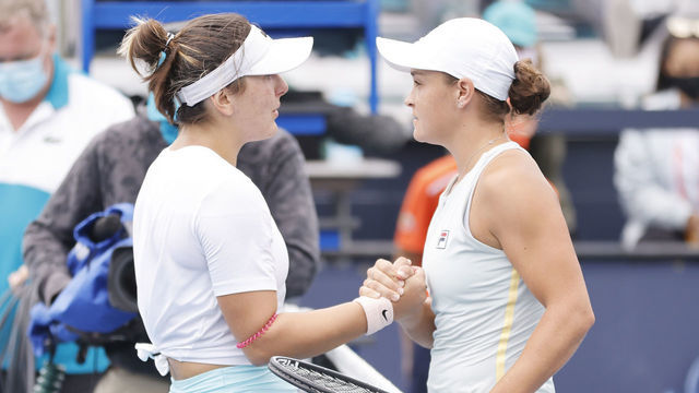 MIAMI GARDENS, FLORIDA - APRIL 03: Bianca Andreescu of Canada shakes hands with Ashleigh Barty of Australia after retiring during the final of the Miami Open at Hard Rock Stadium on April 03, 2021 in Miami Gardens, Florida.