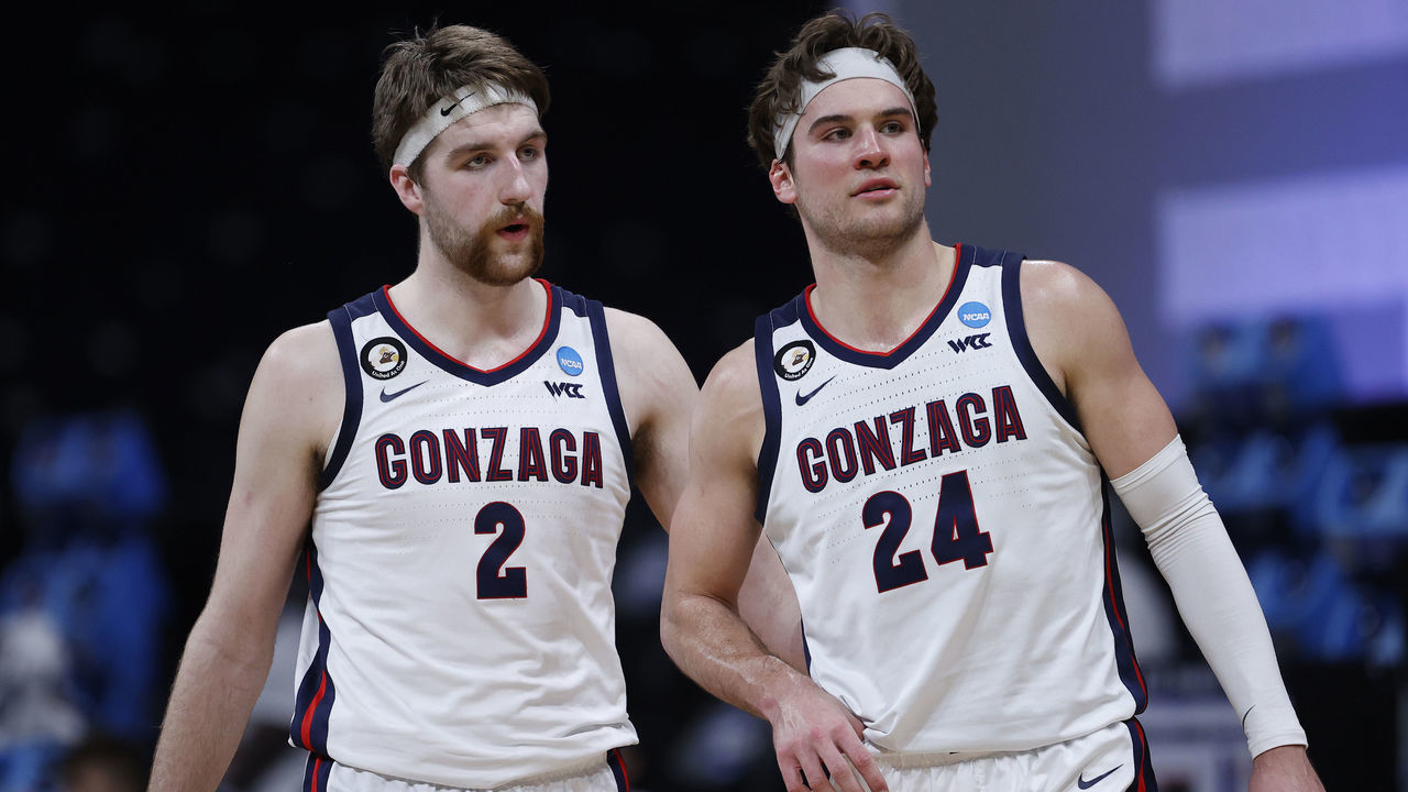 INDIANAPOLIS, INDIANA - MARCH 30: Drew Timme #2 reacts with Corey Kispert #24 of the Gonzaga Bulldogs during the second half against the USC Trojans in the Elite Eight round game of the 2021 NCAA Men's Basketball Tournament at Lucas Oil Stadium on March 30, 2021 in Indianapolis, Indiana.