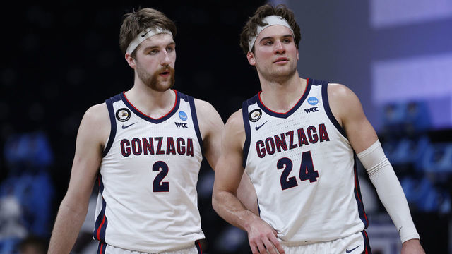 INDIANAPOLIS, INDIANA - MARCH 30: Drew Timme #2 reacts with Corey Kispert #24 of the Gonzaga Bulldogs during the second half against the USC Trojans in the Elite Eight round game of the 2021 NCAA Men's Basketball Tournament at Lucas Oil Stadium on March 30, 2021 in Indianapolis, Indiana.