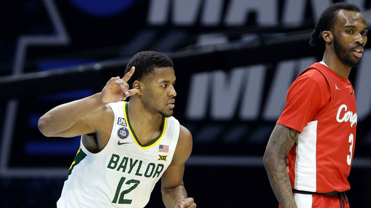INDIANAPOLIS, INDIANA - APRIL 03: Jared Butler #12 of the Baylor Bears reacts in the first half against the Houston Cougars during the 2021 NCAA Final Four semifinal at Lucas Oil Stadium on April 03, 2021 in Indianapolis, Indiana.