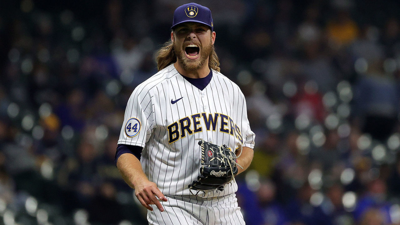 MILWAUKEE, WISCONSIN - APRIL 03: Corbin Burnes #39 of the Milwaukee Brewers reacts to a pitch during the sixth inning against the Minnesota Twins at American Family Field on April 03, 2021 in Milwaukee, Wisconsin.