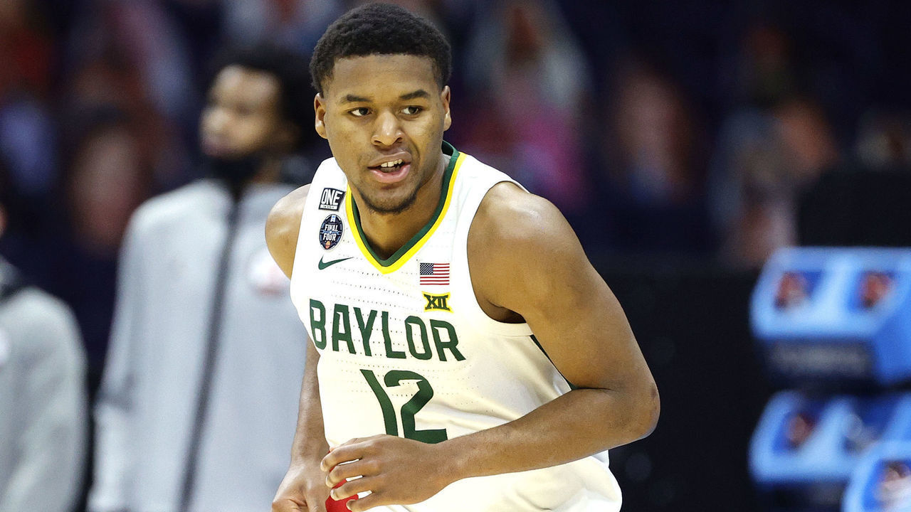 INDIANAPOLIS, INDIANA - APRIL 03: Jared Butler #12 of the Baylor Bears reacts against the Houston Cougars during the 2021 NCAA Final Four semifinal at Lucas Oil Stadium on April 03, 2021 in Indianapolis, Indiana.