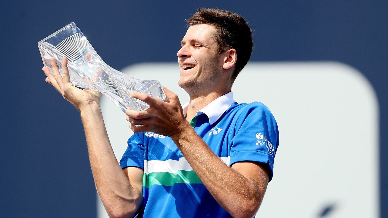 MIAMI GARDENS, FLORIDA - APRIL 04: Hubert Hurkacz of Poland poses with the Butch Buchholz Trophy after defeating Jannik Sinner of Italy during the final of the Miami Open at Hard Rock Stadium on April 04, 2021 in Miami Gardens, Florida.