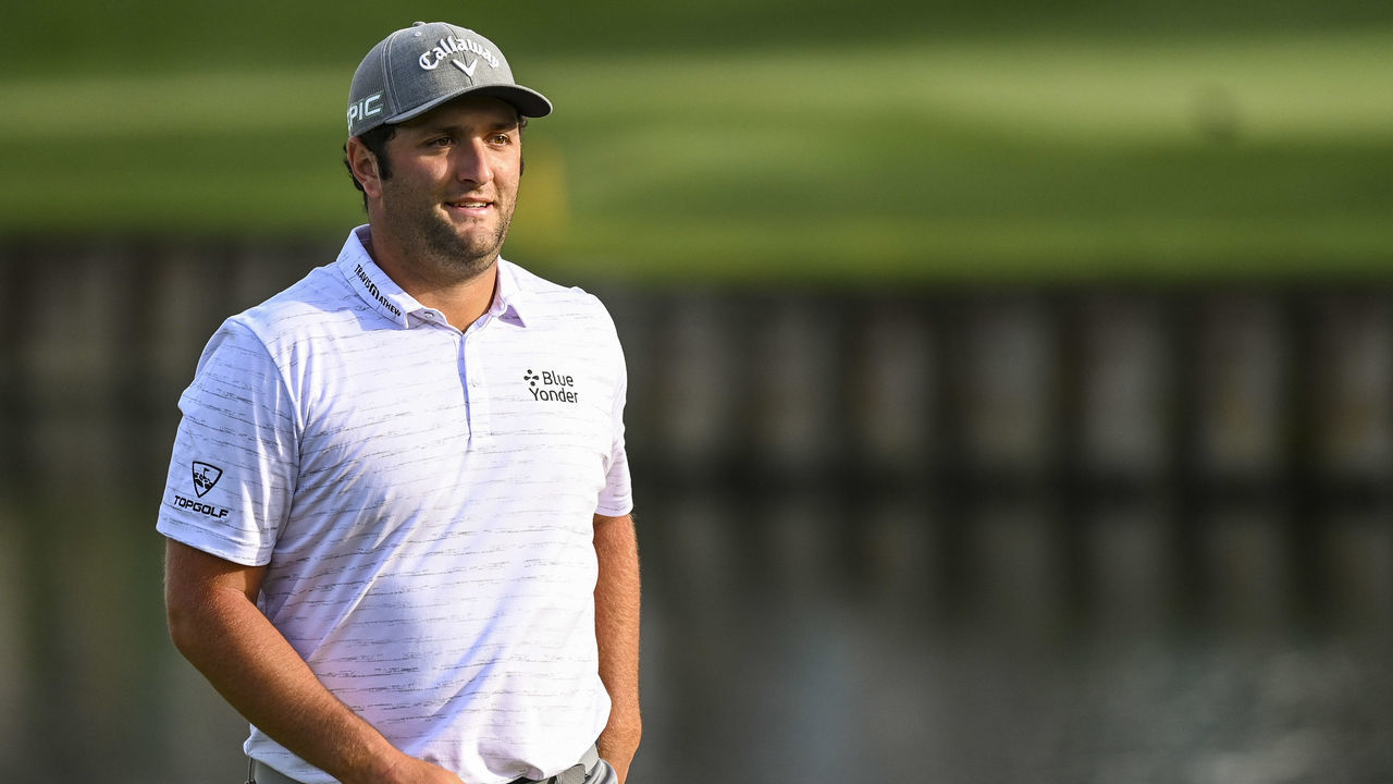 PONTE VEDRA BEACH, FL - MARCH 13: Jon Rahm of Spain smiles as he walks off the 17th hole green during the third round of THE PLAYERS Championship on the Stadium Course at TPC Sawgrass on March 13, 2021, in Ponte Vedra Beach, Florida.