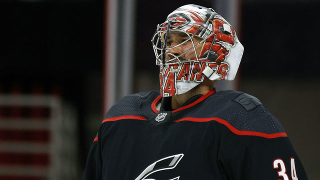 RALEIGH, NORTH CAROLINA - JANUARY 28: Petr Mrazek #34 of the Carolina Hurricanes looks on during the second period of their game against the Tampa Bay Lightning at PNC Arena on January 28, 2021 in Raleigh, North Carolina.