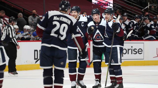 DENVER, COLORADO - APRIL 03: Cale Makar #8 of the Colorado Avalanche celebrates the game winning goal with Devon Toews #7, Nathan MacKinnon #29 and Gabriel Landeskog #92 against the St Louis Blues at Ball Arena on April 03, 2021 in Denver, Colorado.