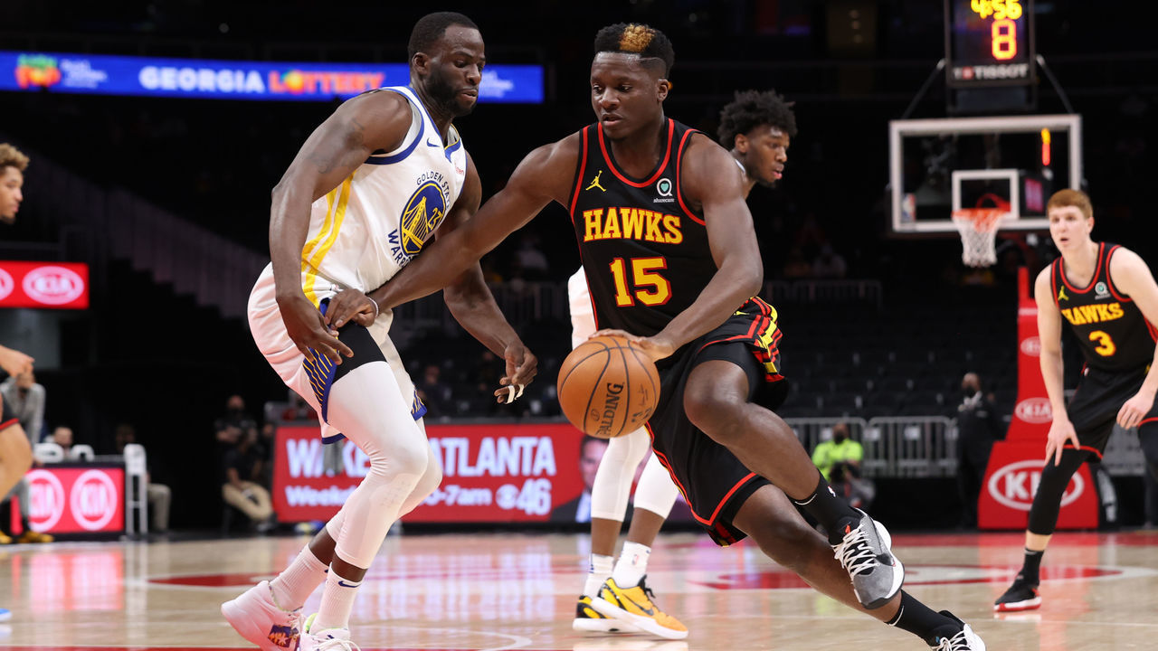 ATLANTA, GA - APRIL 4: Clint Capela #15 of the Atlanta Hawks dribbles the ball during the game against the Golden State Warriors on APRIL 4, 2021 at State Farm Arena in Atlanta, Georgia. NOTE TO USER: User expressly acknowledges and agrees that, by downloading and/or using this Photograph, user is consenting to the terms and conditions of the Getty Images License Agreement. Mandatory Copyright Notice: Copyright 2021 NBAE
