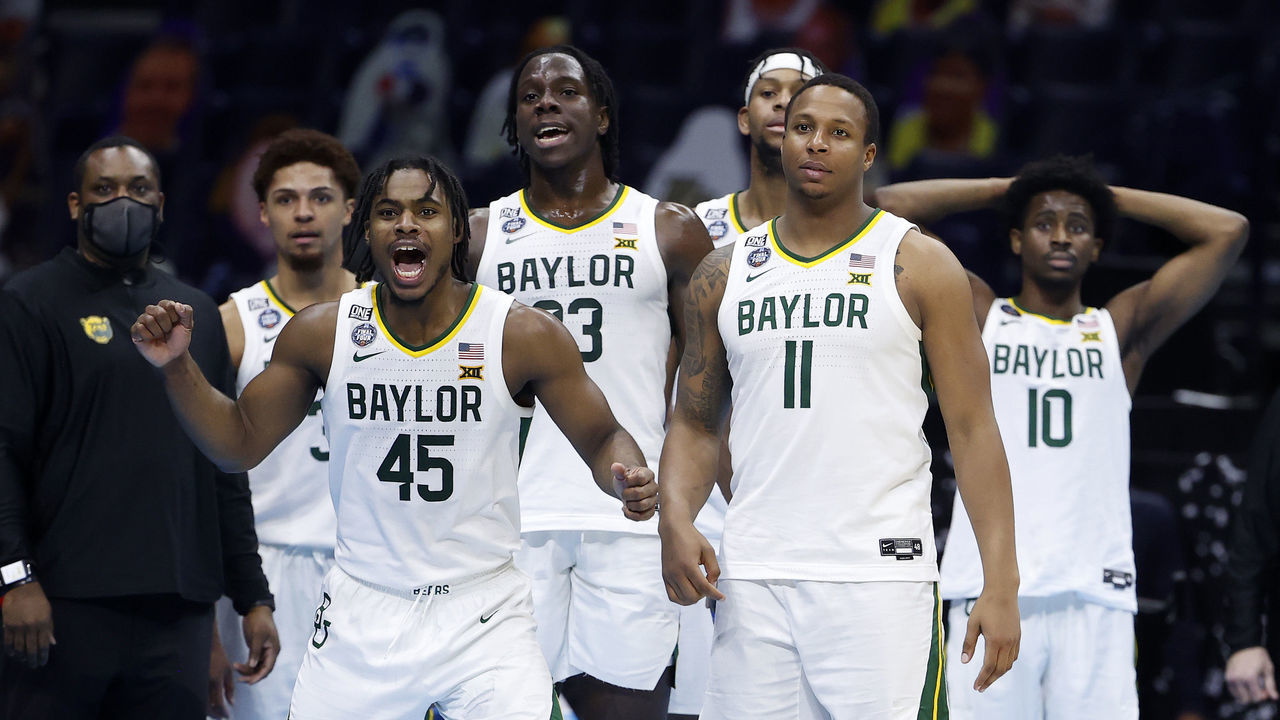 INDIANAPOLIS, INDIANA - APRIL 03: The Baylor Bears celebrate in the final minutes prior to defeating the Houston Cougars 78-59 in the 2021 NCAA Final Four semifinal to advance to the National Championship game at Lucas Oil Stadium on April 03, 2021 in Indianapolis, Indiana.
