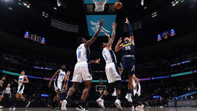 DENVER, CO - APRIL 4: Aaron Gordon #50 of the Denver Nuggets shoots the ball against the Orlando Magic on April 4, 2021 at the Ball Arena in Denver, Colorado. NOTE TO USER: User expressly acknowledges and agrees that, by downloading and/or using this Photograph, user is consenting to the terms and conditions of the Getty Images License Agreement. Mandatory Copyright Notice: Copyright 2021 NBAE