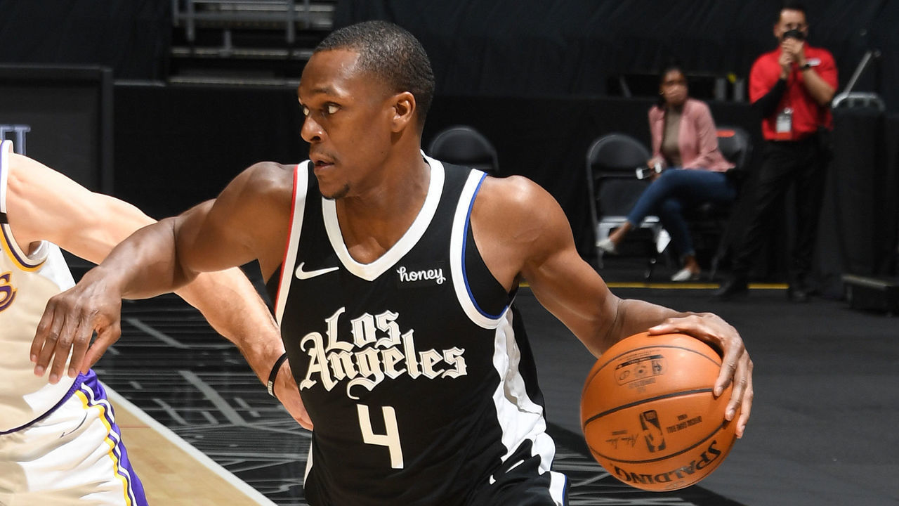 LOS ANGELES, CA - APRIL 4: Rajon Rondo #4 of the LA Clippers dribbles the ball during the game against the Los Angeles Lakers on April 4, 2021 at STAPLES Center in Los Angeles, California. NOTE TO USER: User expressly acknowledges and agrees that, by downloading and/or using this Photograph, user is consenting to the terms and conditions of the Getty Images License Agreement. Mandatory Copyright Notice: Copyright 2021 NBAE