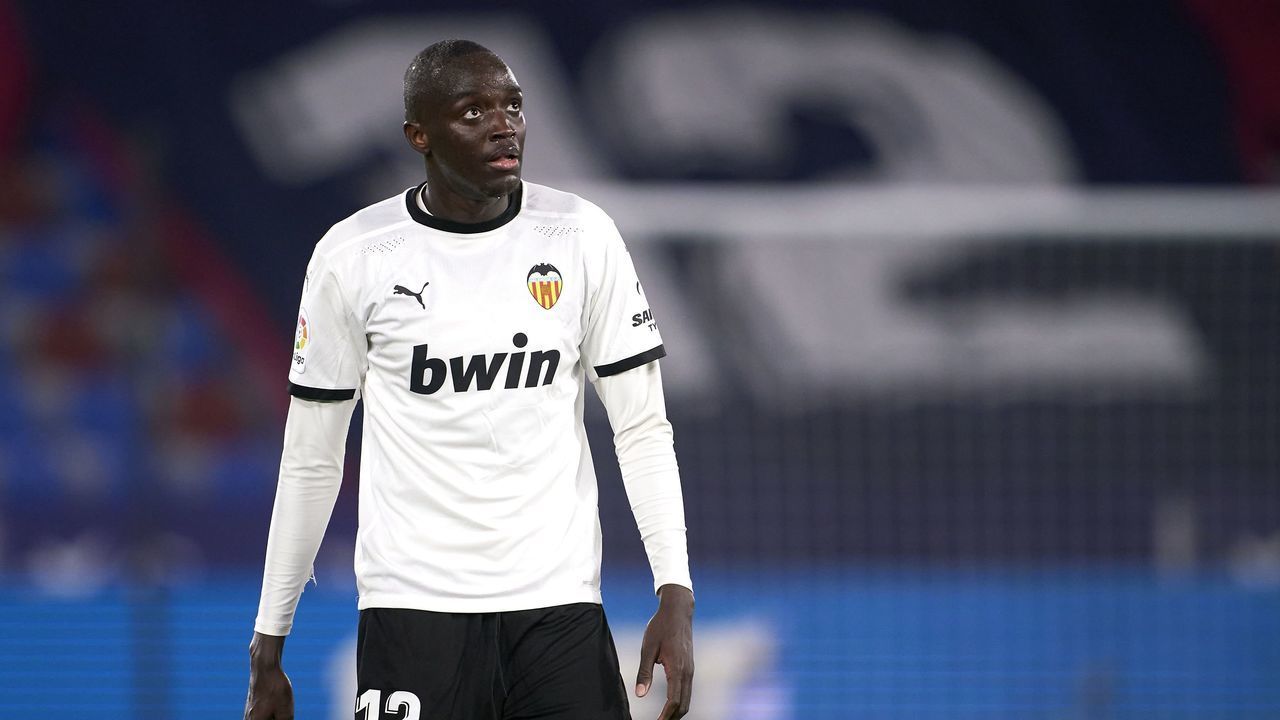 VALENCIA, SPAIN - MARCH 12: Mouctar Diakhaby of Valencia CF looks on during the La Liga Santander match between Levante UD and Valencia CF at Ciutat de Valencia Stadium on March 12, 2021 in Valencia, Spain. Sporting stadiums around Spain remain under strict restrictions due to the Coronavirus Pandemic as Government social distancing laws prohibit fans inside venues resulting in games being played behind closed doors.