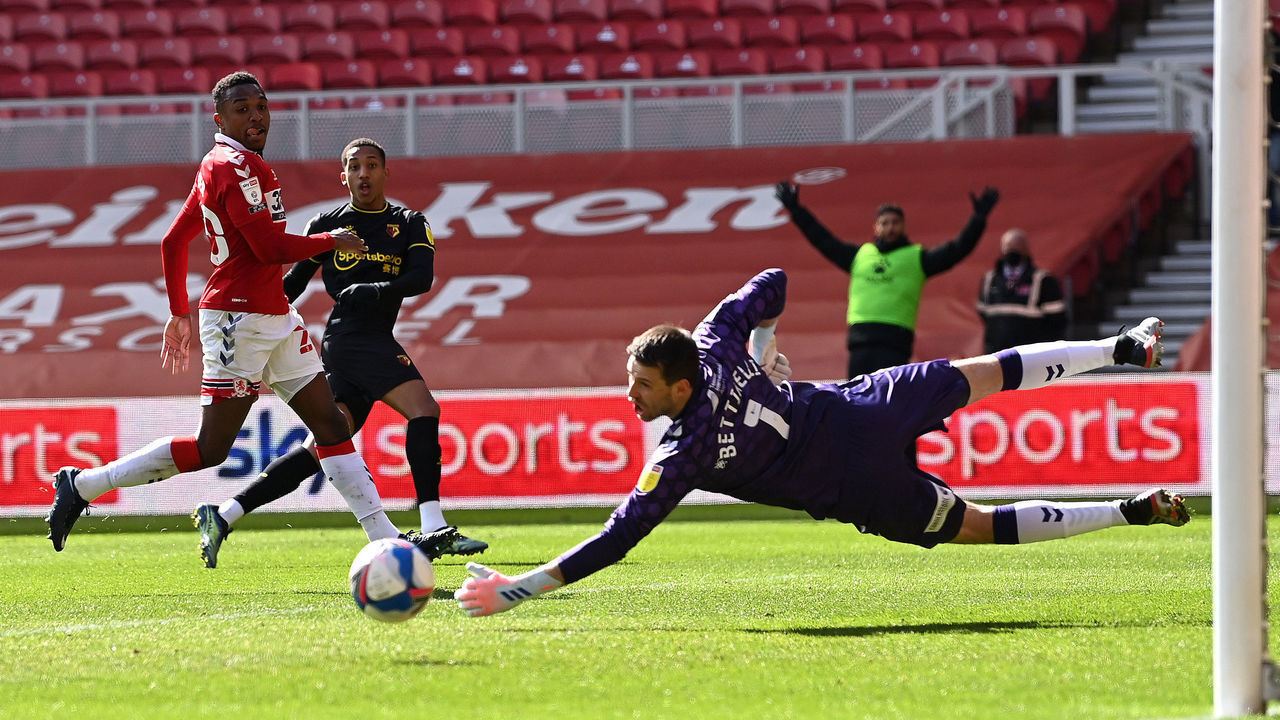 MIDDLESBROUGH, ENGLAND - APRIL 05: Joao Pedro of Watford shoots wide past Marcus Bettinelli of Middlesbrough during the Sky Bet Championship match between Middlesbrough and Watford at Riverside Stadium on April 05, 2021 in Middlesbrough, England. Sporting stadiums around the UK remain under strict restrictions due to the Coronavirus Pandemic as Government social distancing laws prohibit fans inside venues resulting in games being played behind closed doors.