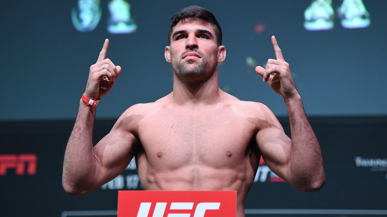 PHOENIX, ARIZONA - FEBRUARY 16: Vicente Luque poses on the scale during the UFC Fight Night weigh-in at Comerica Theatre on February 16, 2019 in the Phoenix, Arizona.