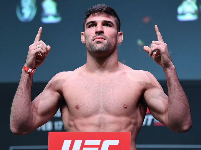 PHOENIX, ARIZONA - FEBRUARY 16: Vicente Luque poses on the scale during the UFC Fight Night weigh-in at Comerica Theatre on February 16, 2019 in the Phoenix, Arizona.