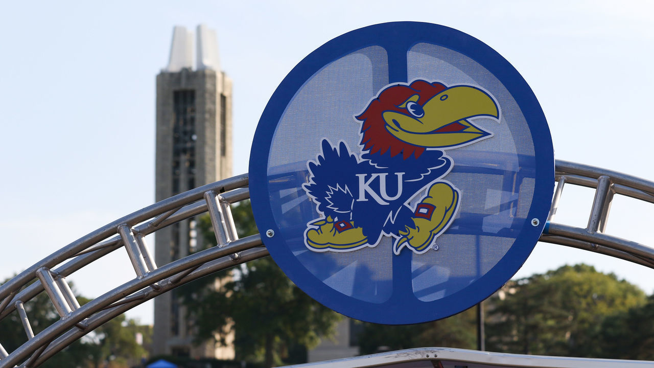LAWRENCE, KS - SEPTEMBER 07: A view of the Kansas Jayhawks logo with the Campanile Bell Tower in the distance before an FBS football game between the Coastal Carolina Chanticleers and Kansas Jayhawks on September 7, 2019 at Memorial Stadium in Lawrence, KS.