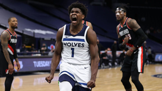 MINNEAPOLIS, MN - MARCH 14: Anthony Edwards #1 of the Minnesota Timberwolves celebrates a dunk during the game against the Portland Trail Blazers on March 14, 2021 at Target Center in Minneapolis, Minnesota. Mandatory Copyright Notice: Copyright 2021 NBAE