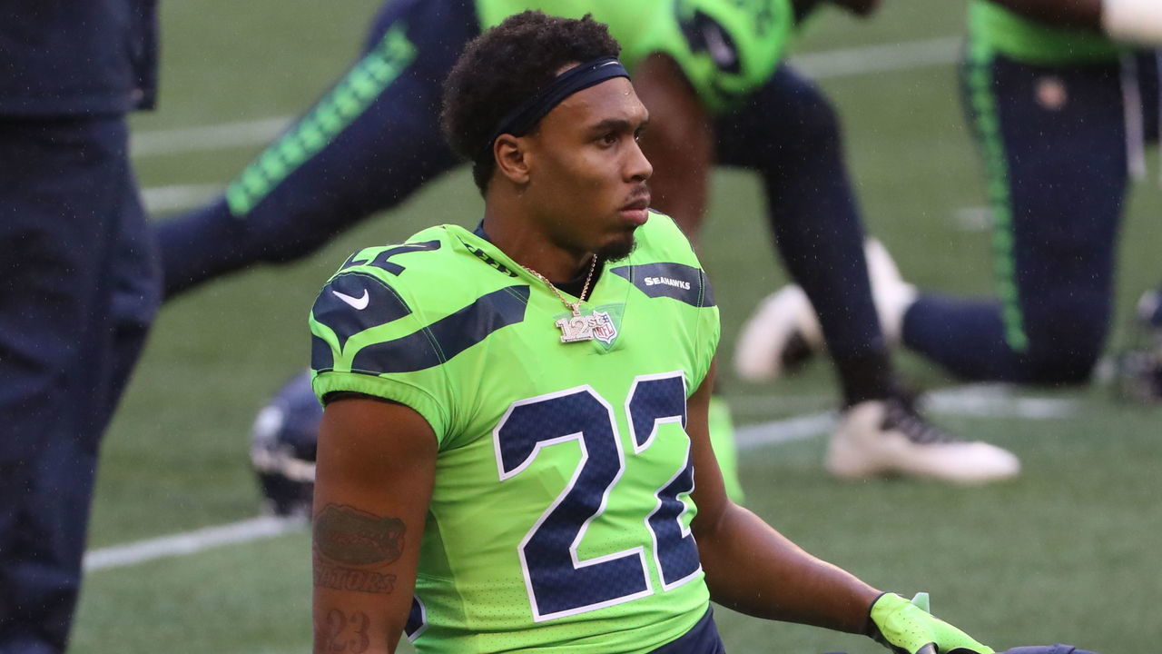 SEATTLE, WASHINGTON - OCTOBER 11: Quinton Dunbar #22 of the Seattle Seahawks stretches before their game against the Minnesota Vikings at CenturyLink Field on October 11, 2020 in Seattle, Washington.