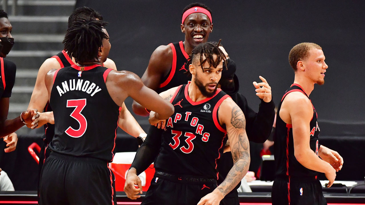TAMPA, FLORIDA - APRIL 05: Gary Trent Jr. #33 of the Toronto Raptors celebrates with teammates after scoring a 3-point buzzer beater to defeat the Washington Wizards 103-101 at Amalie Arena on April 05, 2021 in Tampa, Florida.